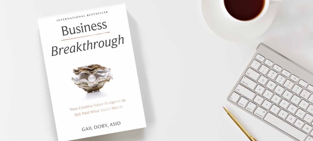 Business Breakthrough book on desktop